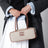Borsa Beau piccola in canvas e pelle
