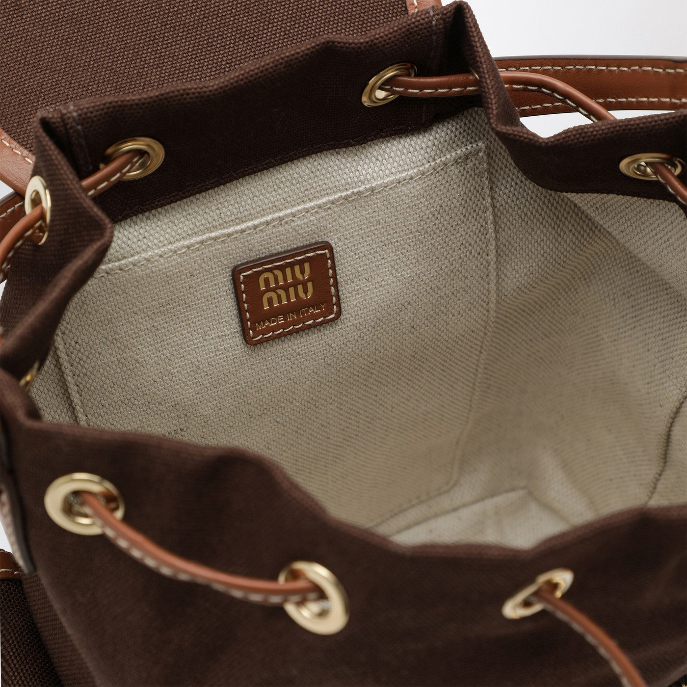 Backpack in hemp and leather cacao/brandy