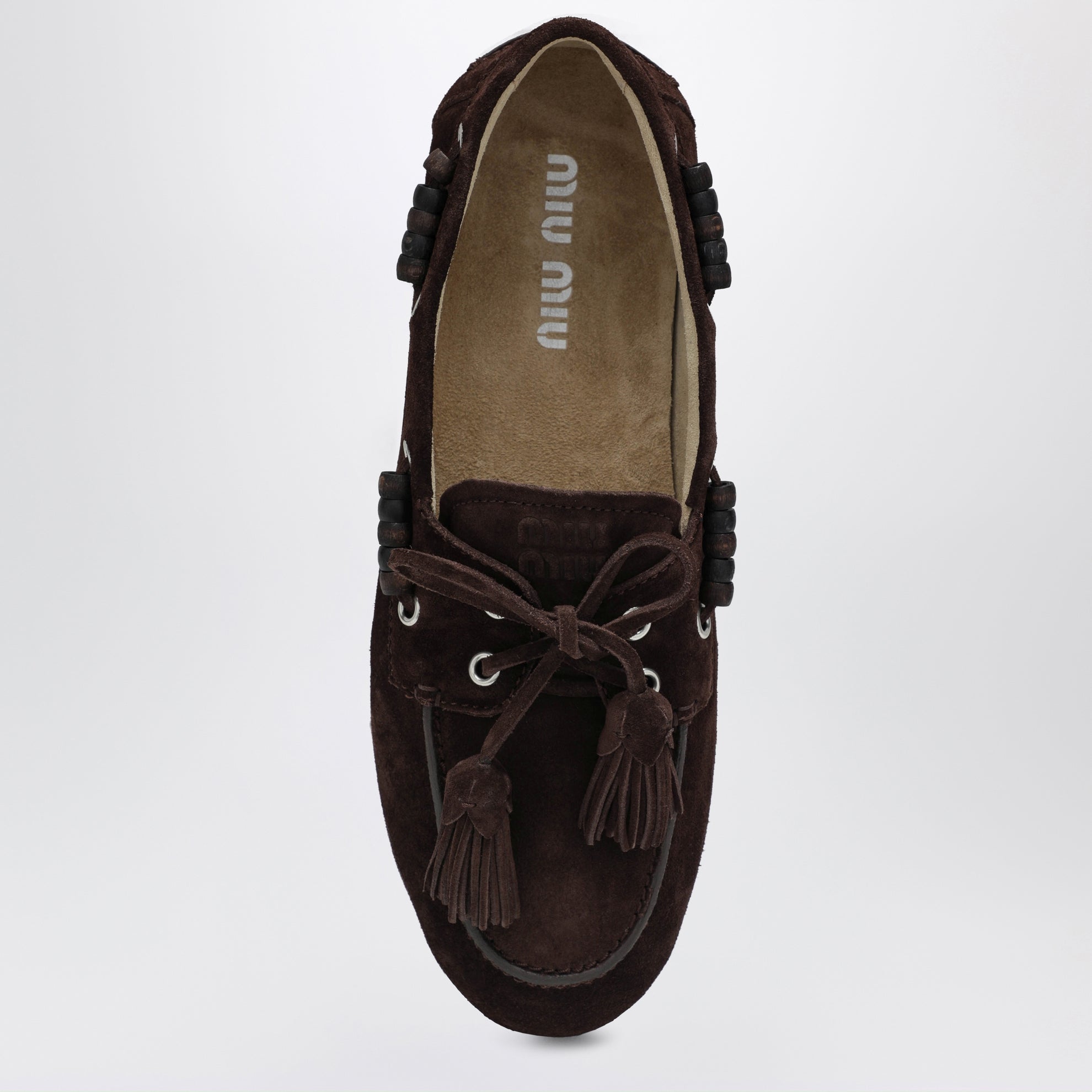 Deck shoes in suede with dark brown tassels