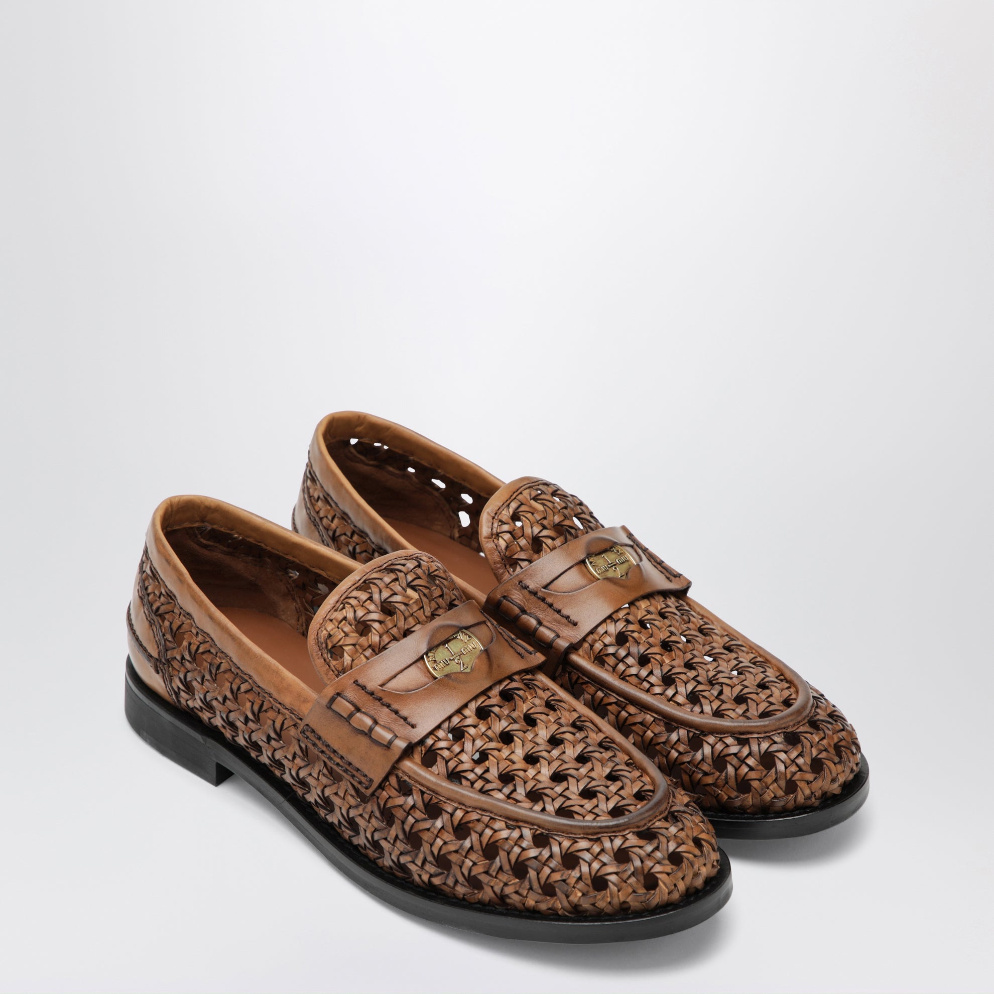 Mocassins penny en cuir tressé couleur cognac
