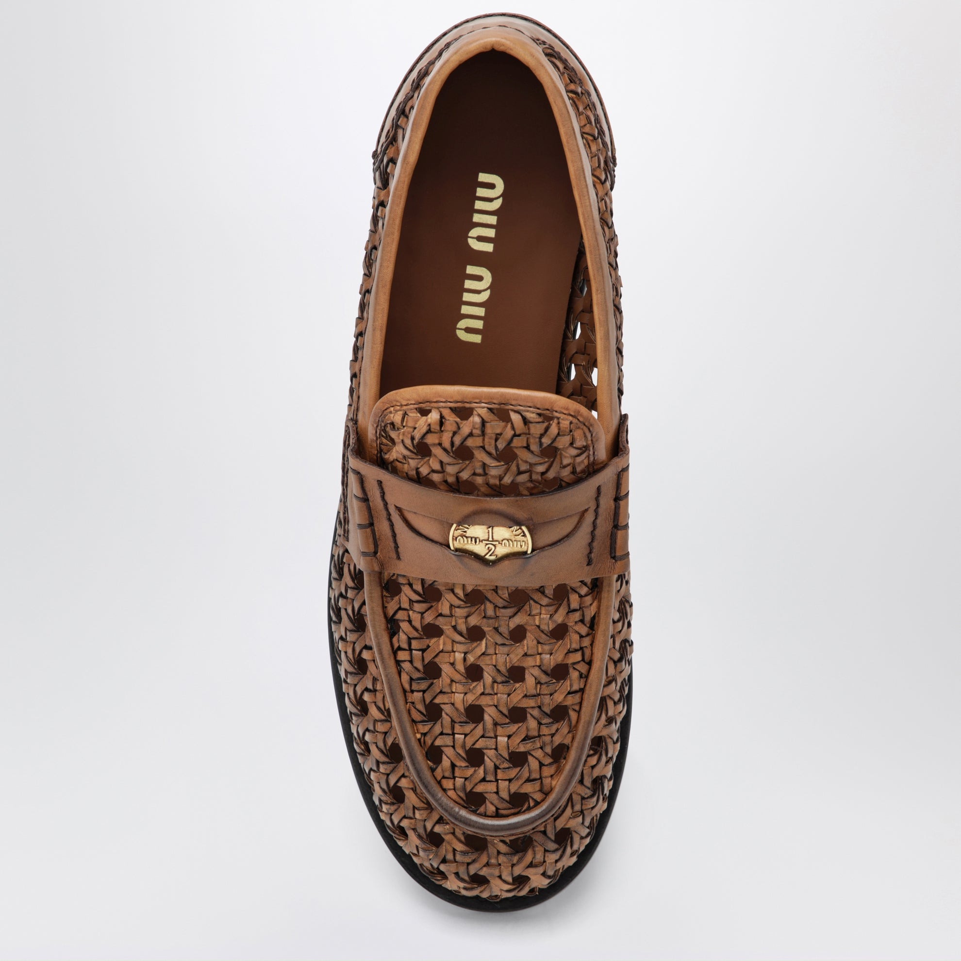 Mocassins penny en cuir tressé couleur cognac