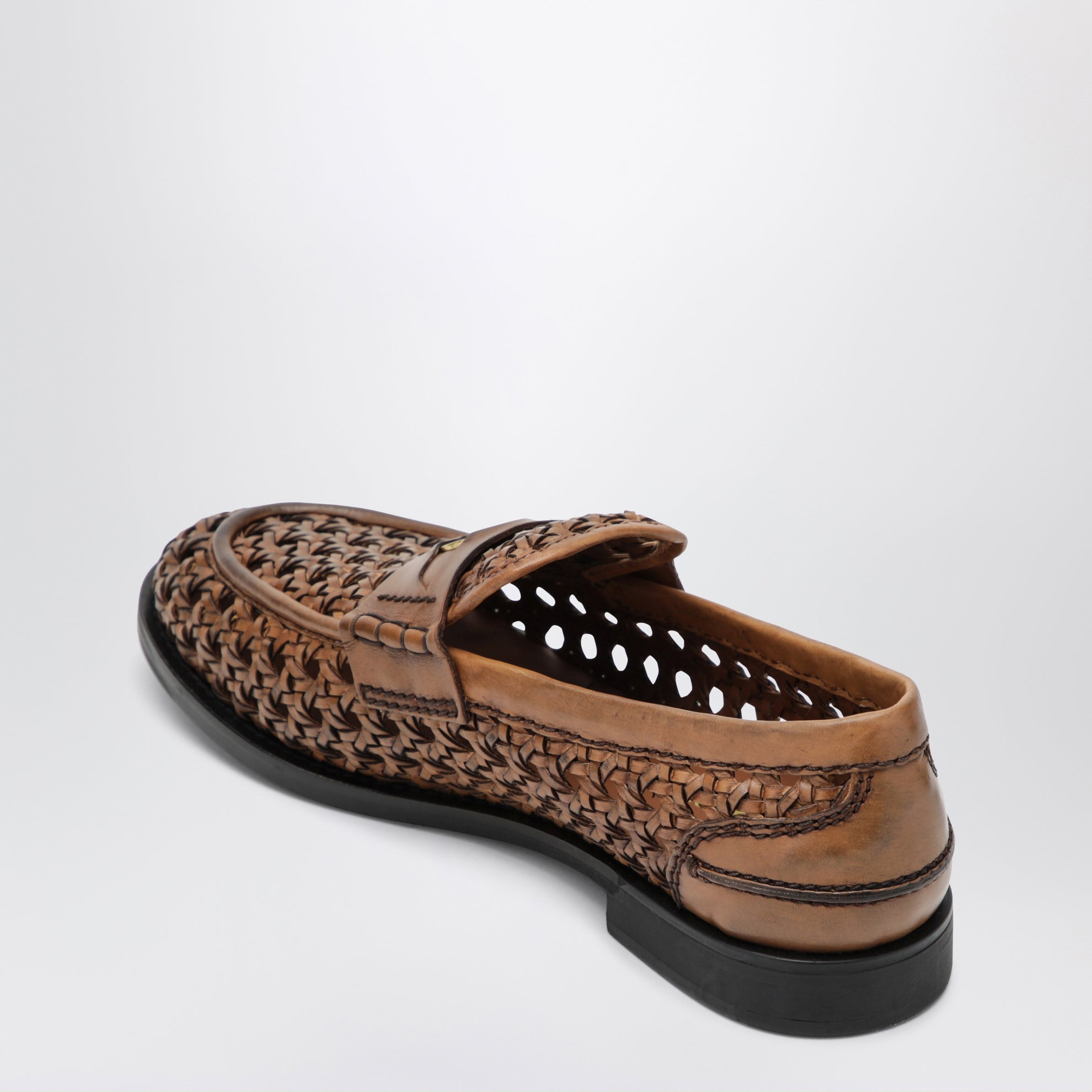 Mocassins penny en cuir tressé couleur cognac