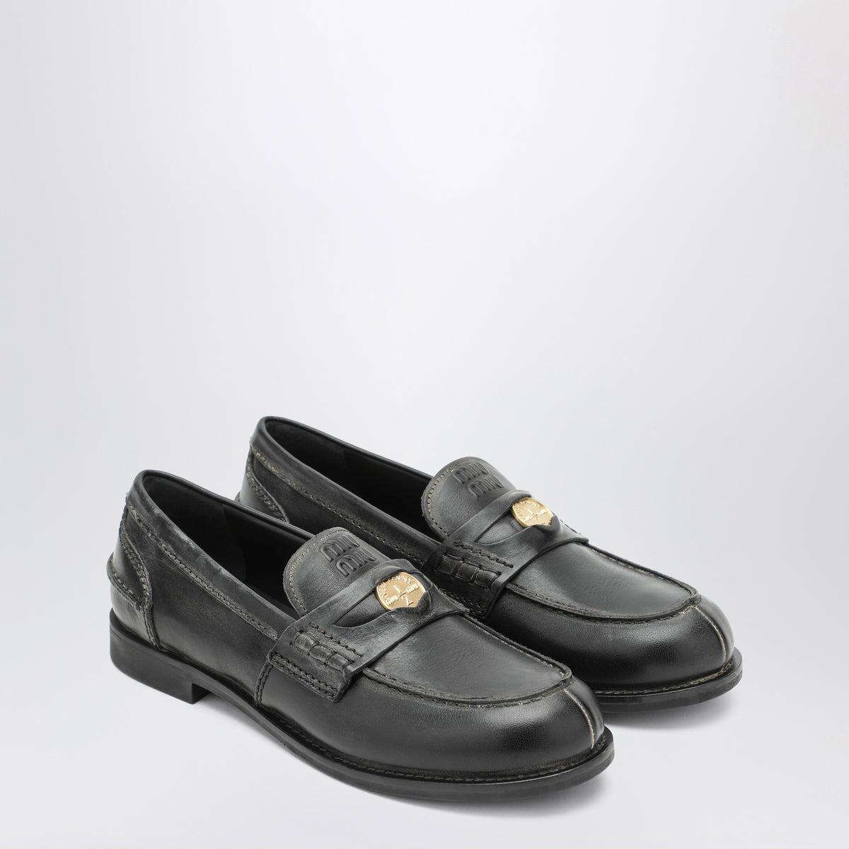 Schwarze Mokassins aus Leder im Vintage-Look