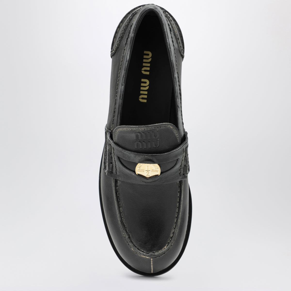 Schwarze Mokassins aus Leder im Vintage-Look