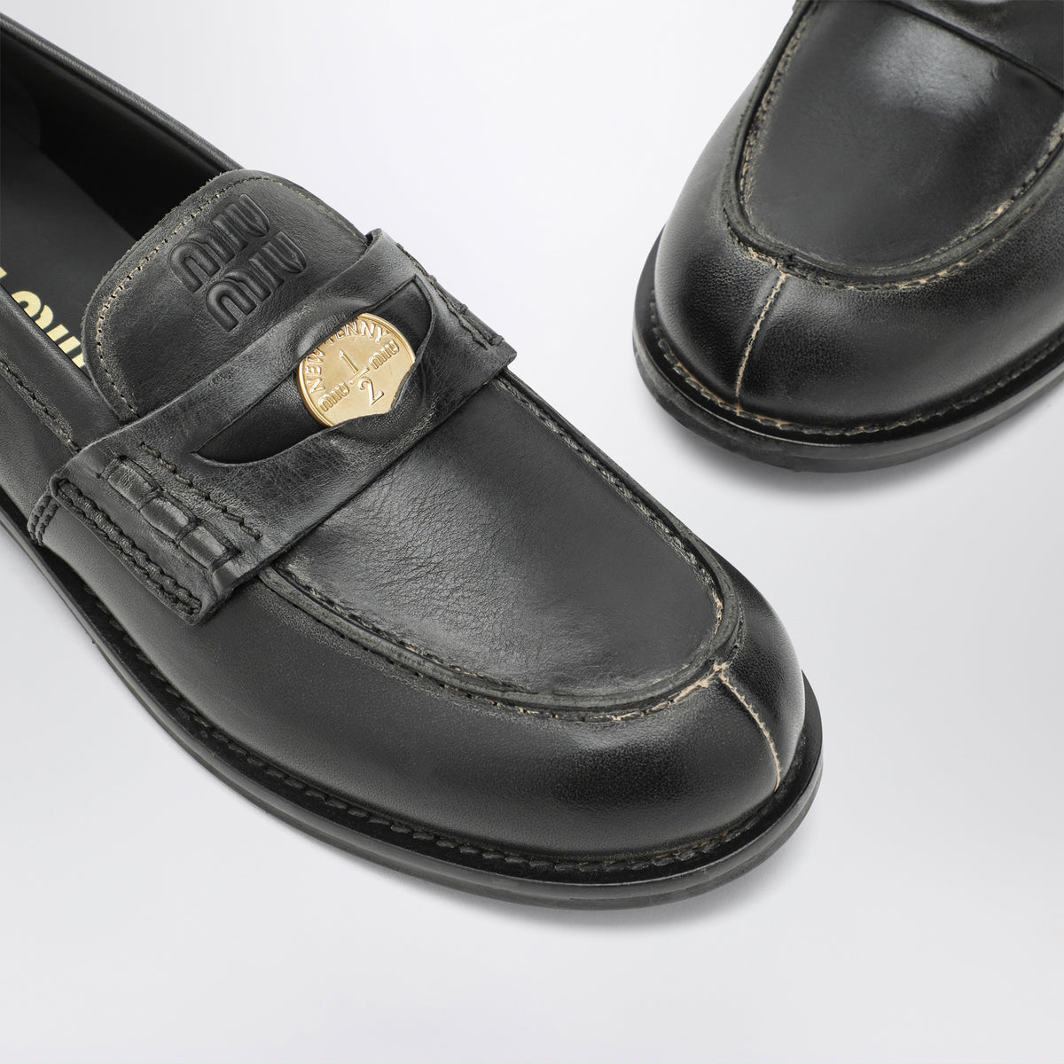 Schwarze Mokassins aus Leder im Vintage-Look