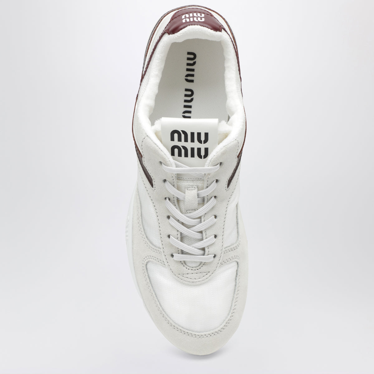 Gymnasium sneakers in white and amaranth in technical fabric and suede
