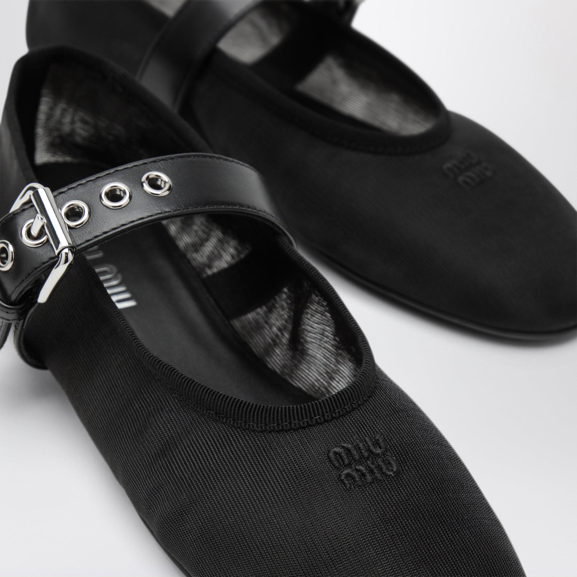 Black fabric ballet flats with buckle