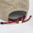 Washed denim baseball cap in beige and burgundy