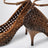 Décolleté in pelle intrecciata color Cognac