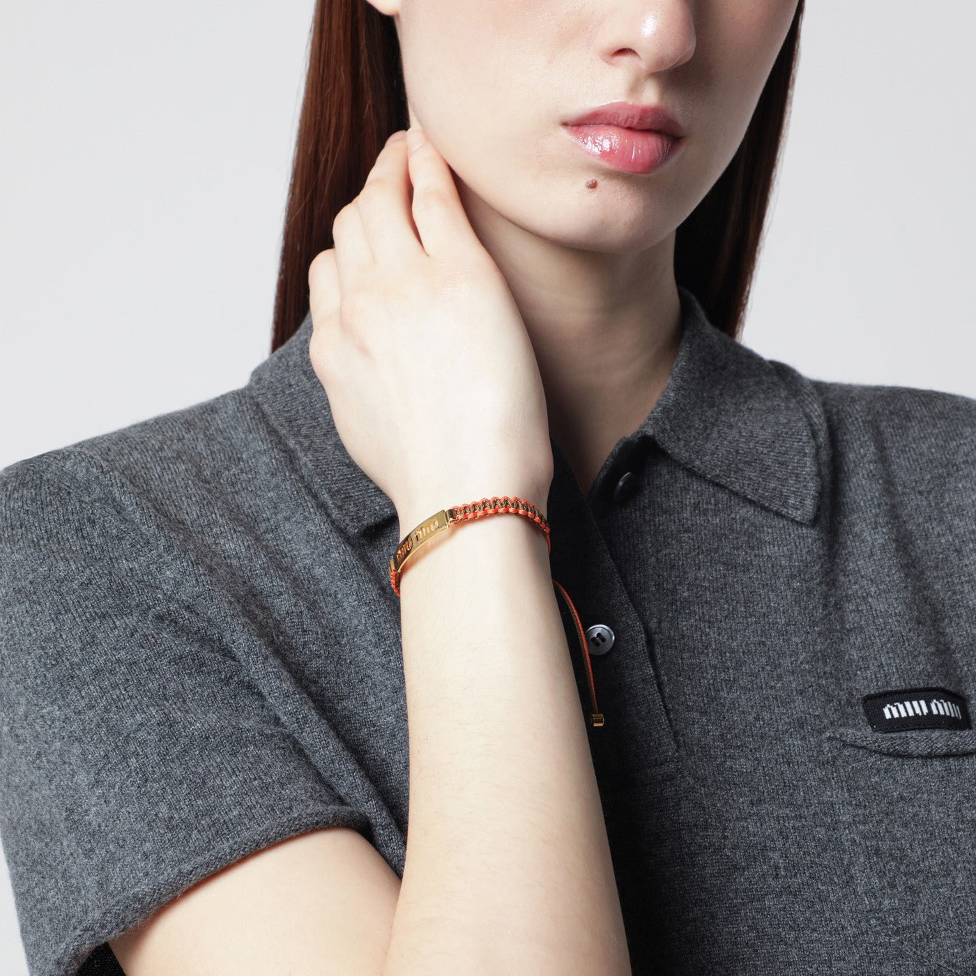 Olive green/orange braided cord bracelet