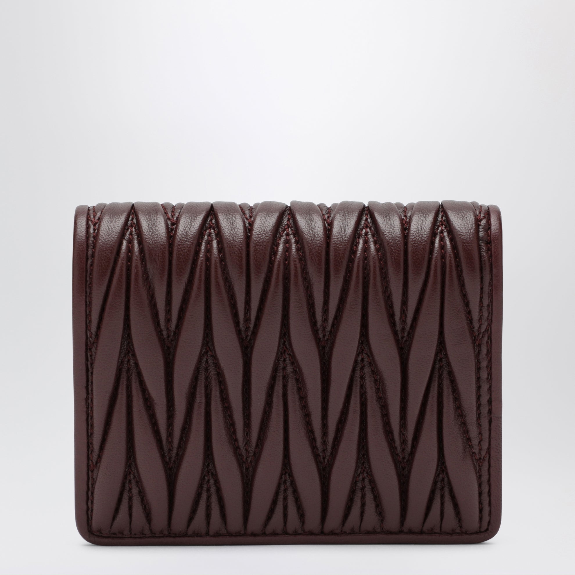 Portafoglio in nappa matelassé bordeaux