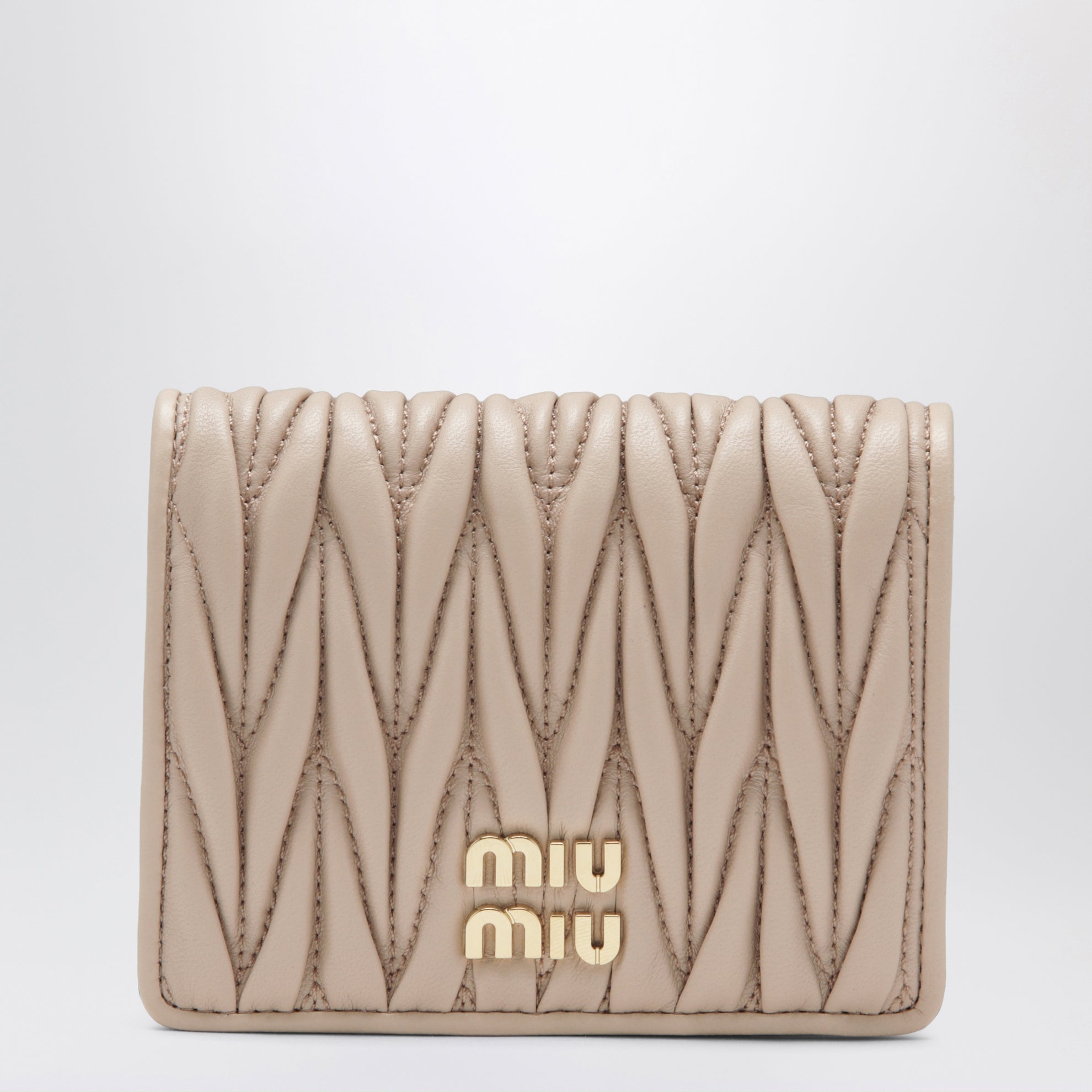Portefeuille en cuir nappa matelassé couleur rose poudré