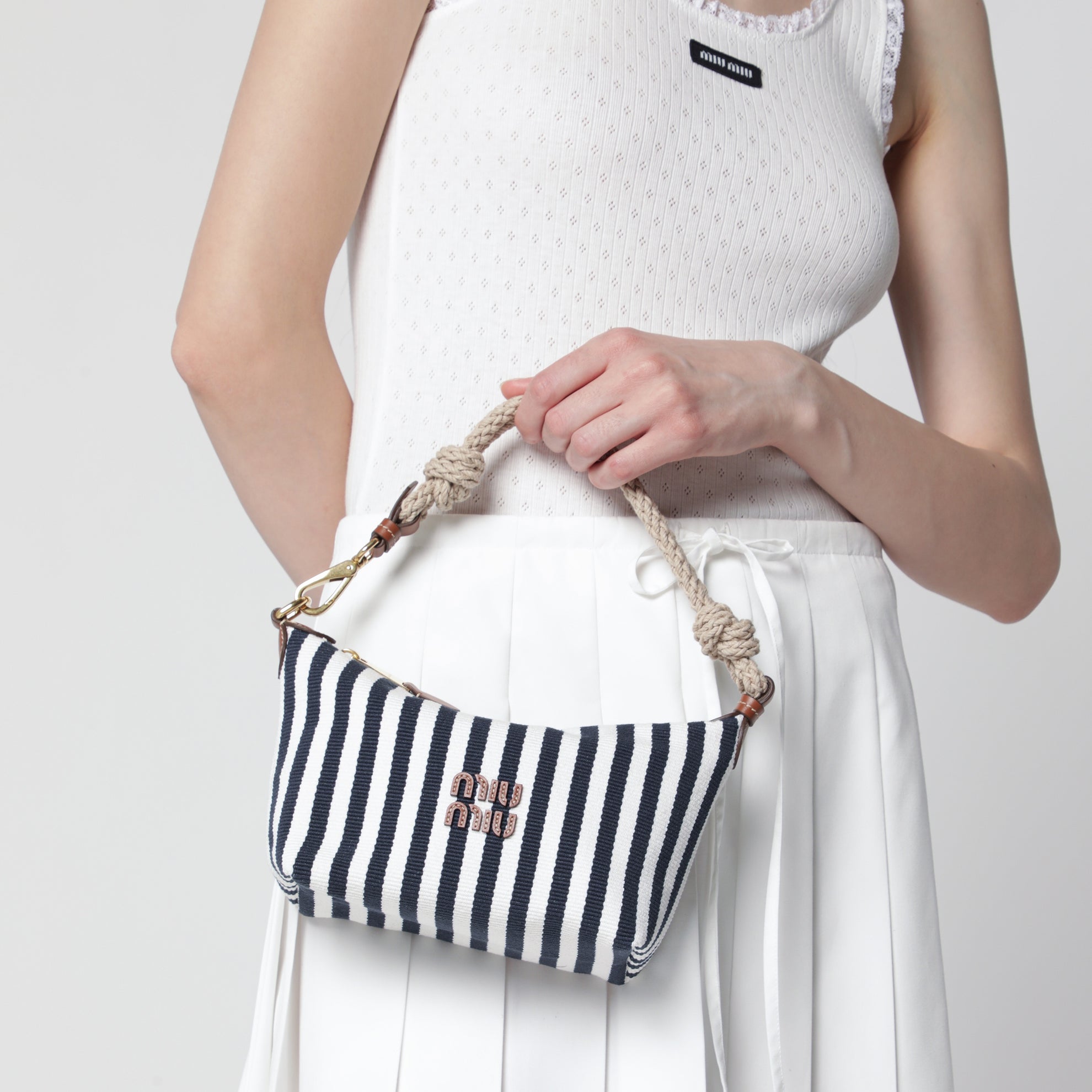Striped jacquard cotton and leather pouch, blue/cognac