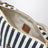 Striped jacquard cotton and leather pouch, blue/cognac