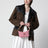Pouch in cotone jacquard a righe rubino e cognac