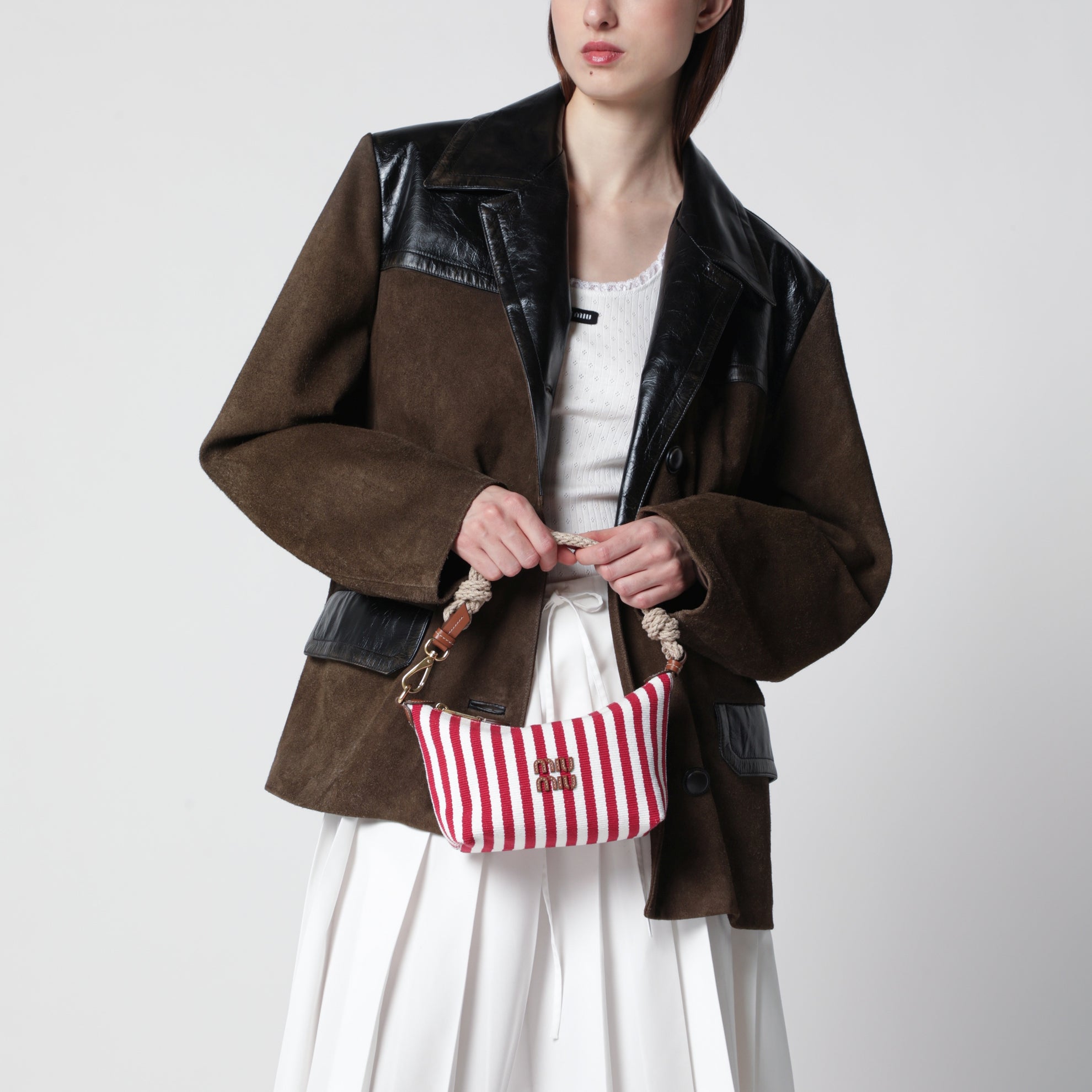 Pochette rayée en coton jacquard et cuir rubis cognac