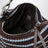 Pouch a righe in crochet di cotone cacao/celeste