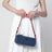 Pouch in gabardine di cotone indaco e amaranto