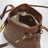 Pochette en cuir nappa couleur chêne