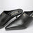Schwarze Mules aus Leder mit Absatz