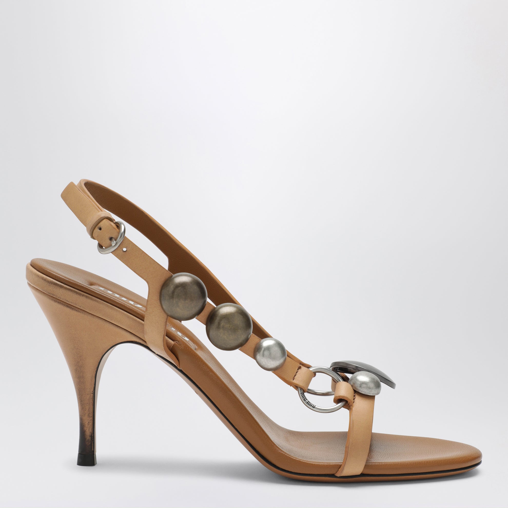 Honey-colored leather sandals with metal details