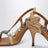 Honey-colored leather sandals with metal details