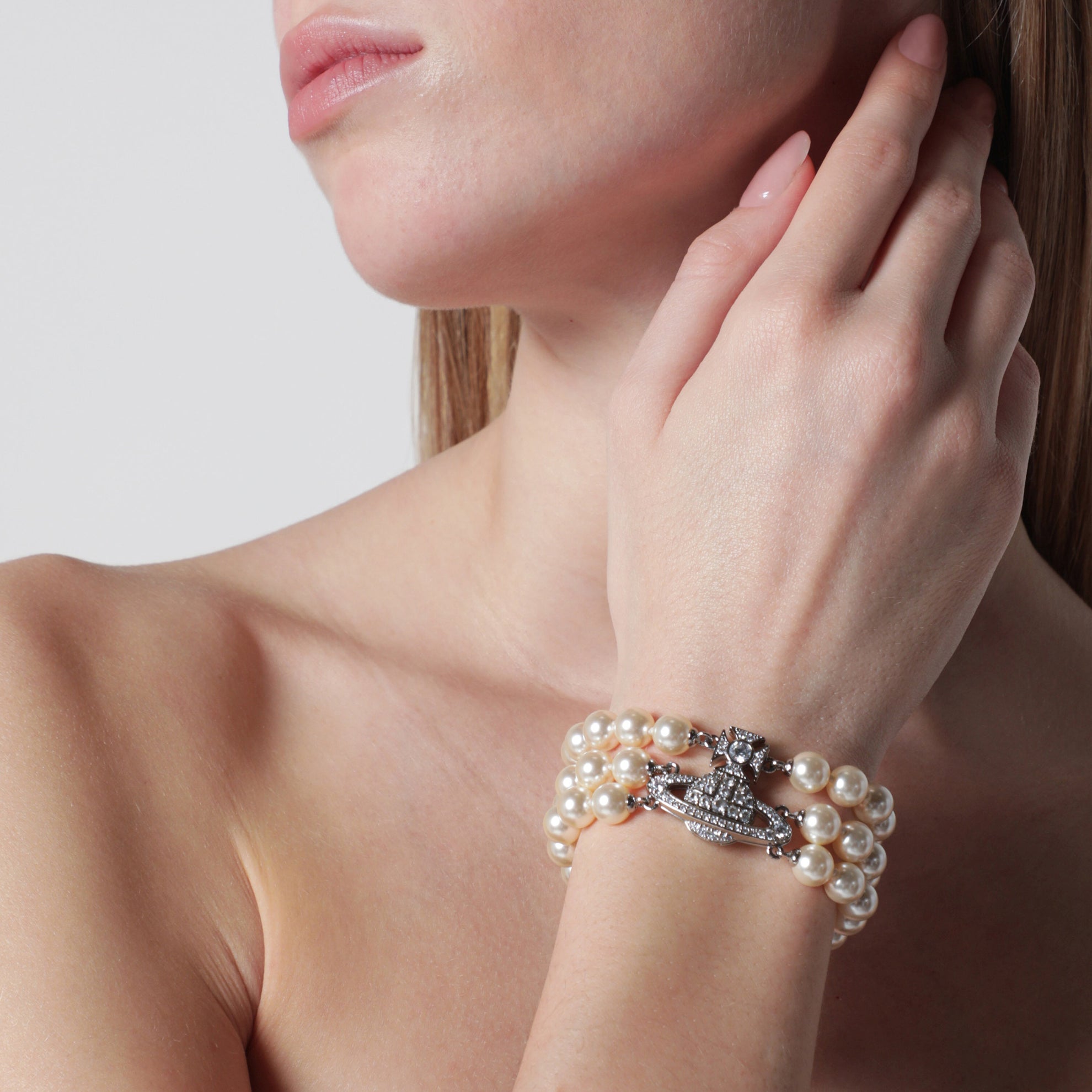 Bracciale Orb platino a tre giri con perle