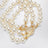 Bracciale Orb oro a tre giri con perle