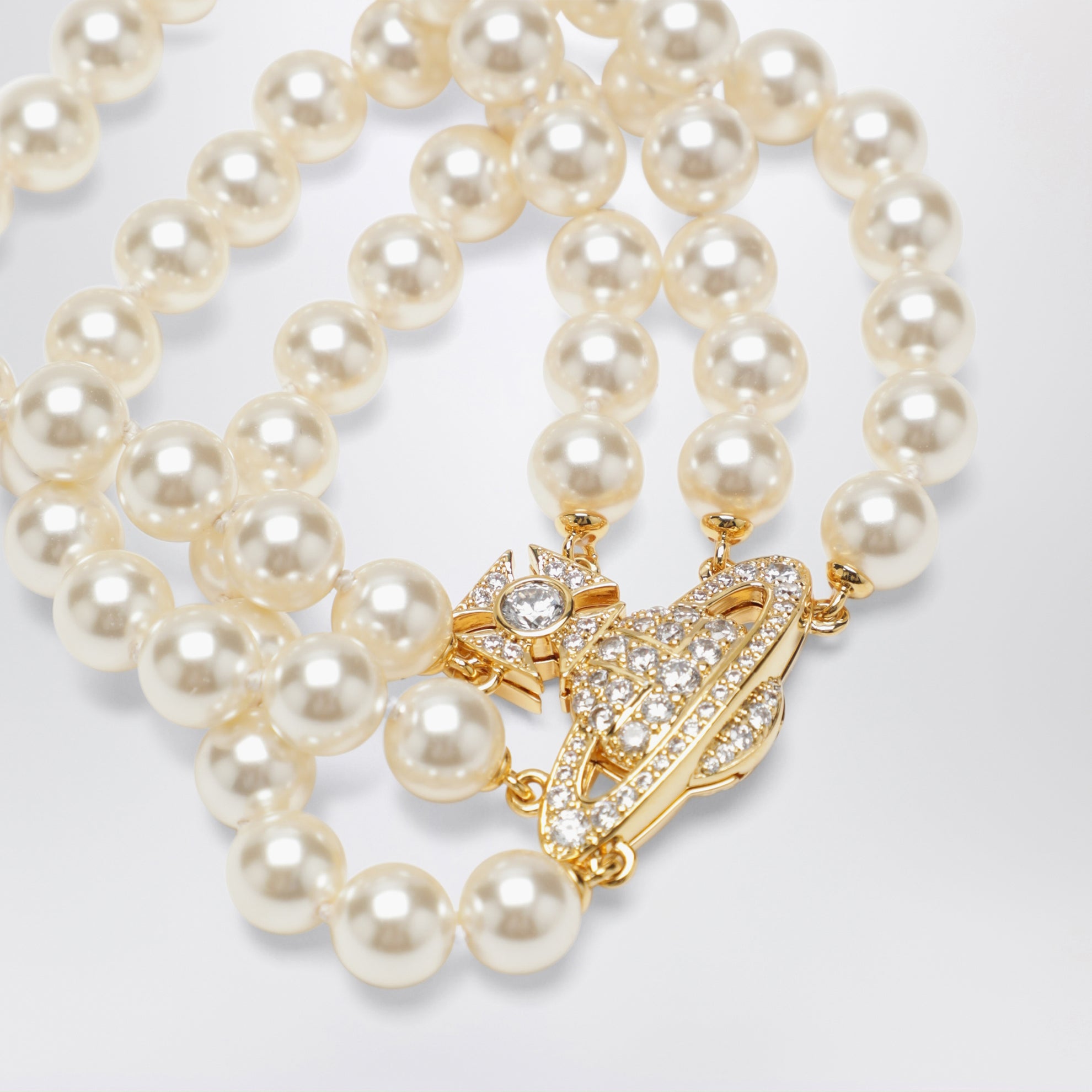 Bracciale Orb oro a tre giri con perle