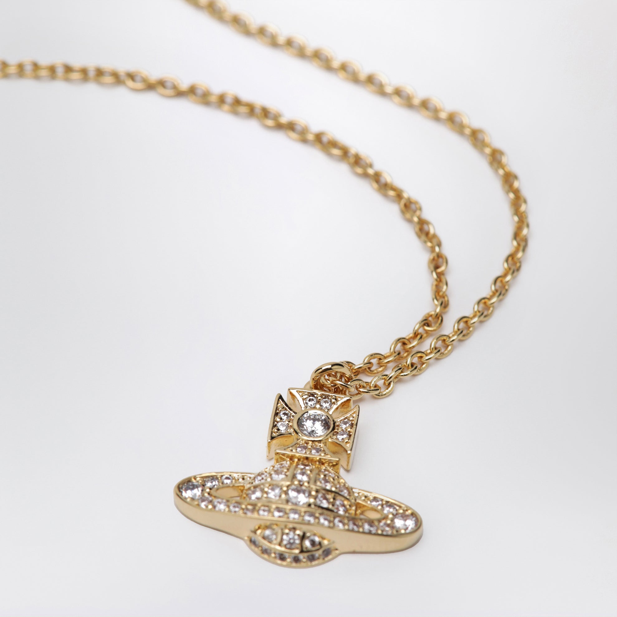 Orb pendant necklace in gold-tone metal with crystals