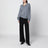 Gine grauer Polopullover aus Wolle und Kaschmir