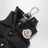Porte-clés en forme de doudoune noire en nylon