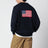 Maglione a polo blu navy con bandiera