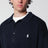 Maglione a polo blu navy con bandiera