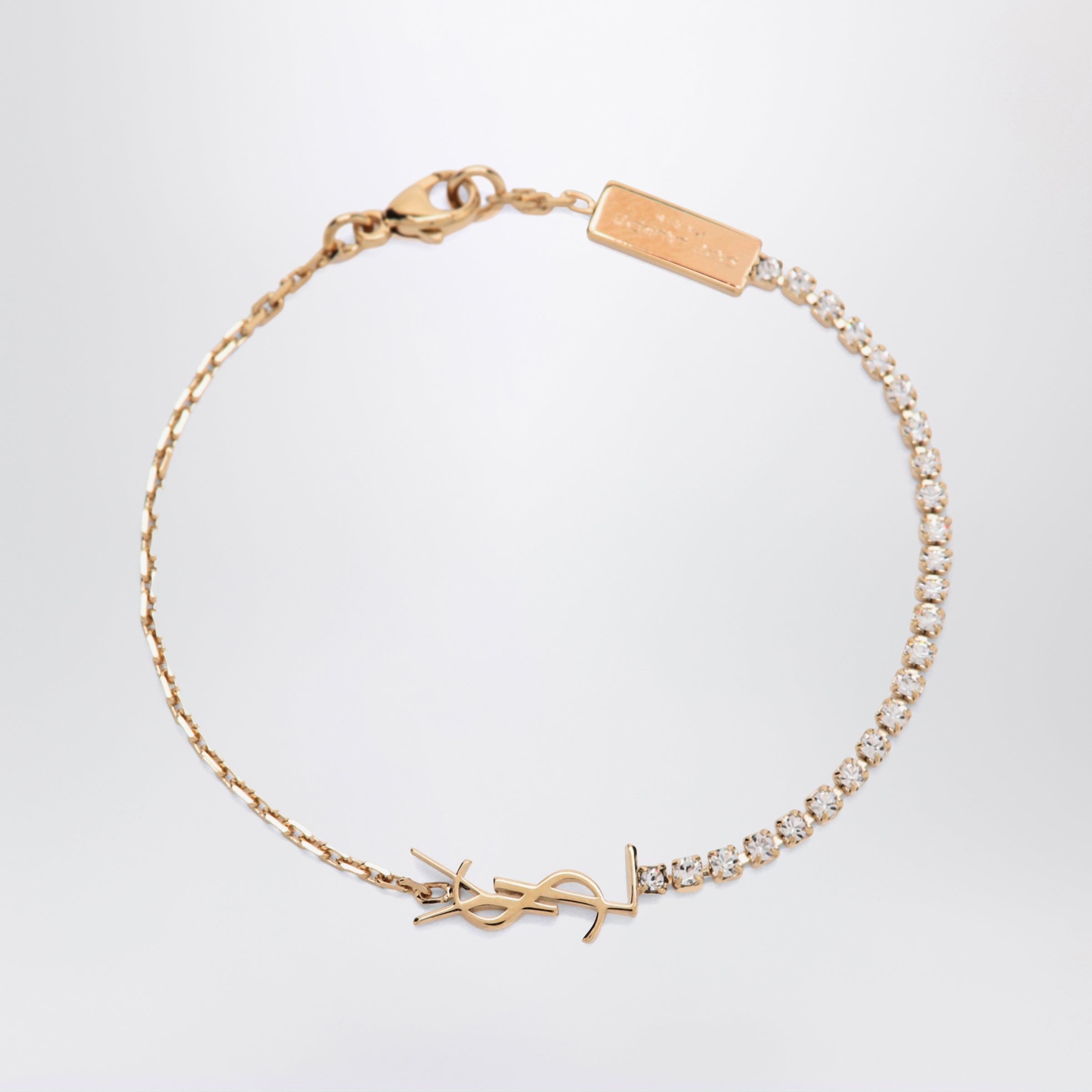 Saint Laurent Cassandre charm bracelet in gold-tone metal | TheDoubleF