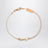 Bracelet avec charme Cassandre en métal doré