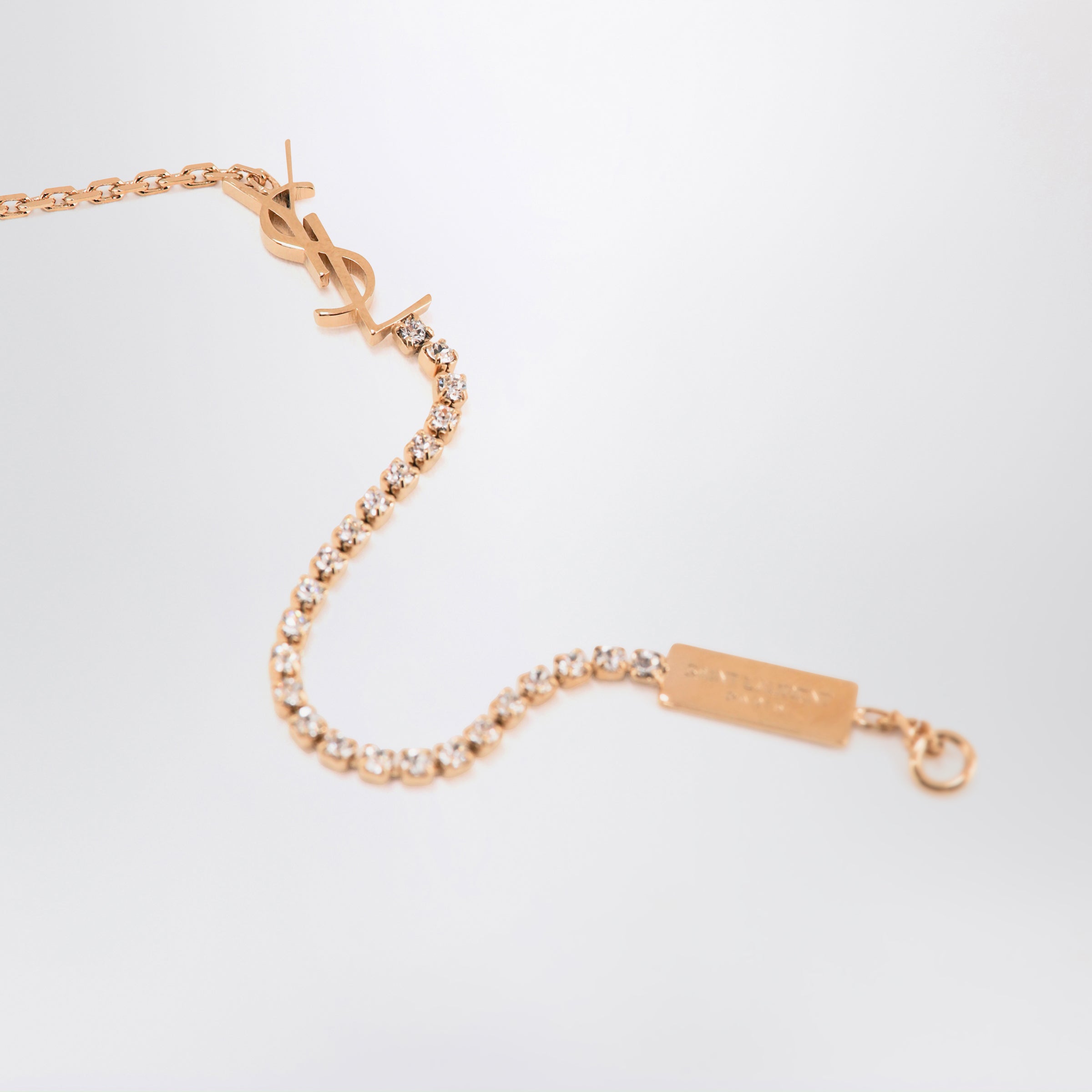 Saint Laurent Cassandre charm bracelet in gold-tone metal | TheDoubleF