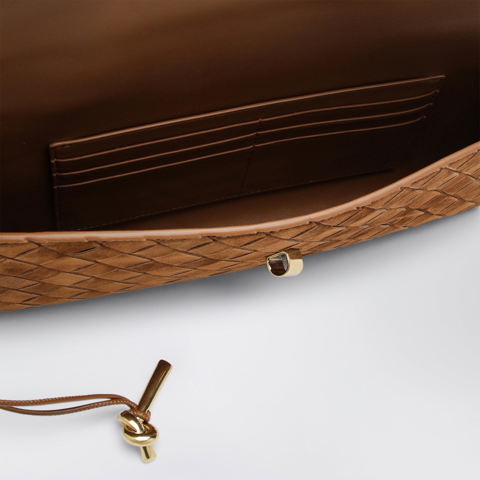Andiamo clutch with brown suede handle