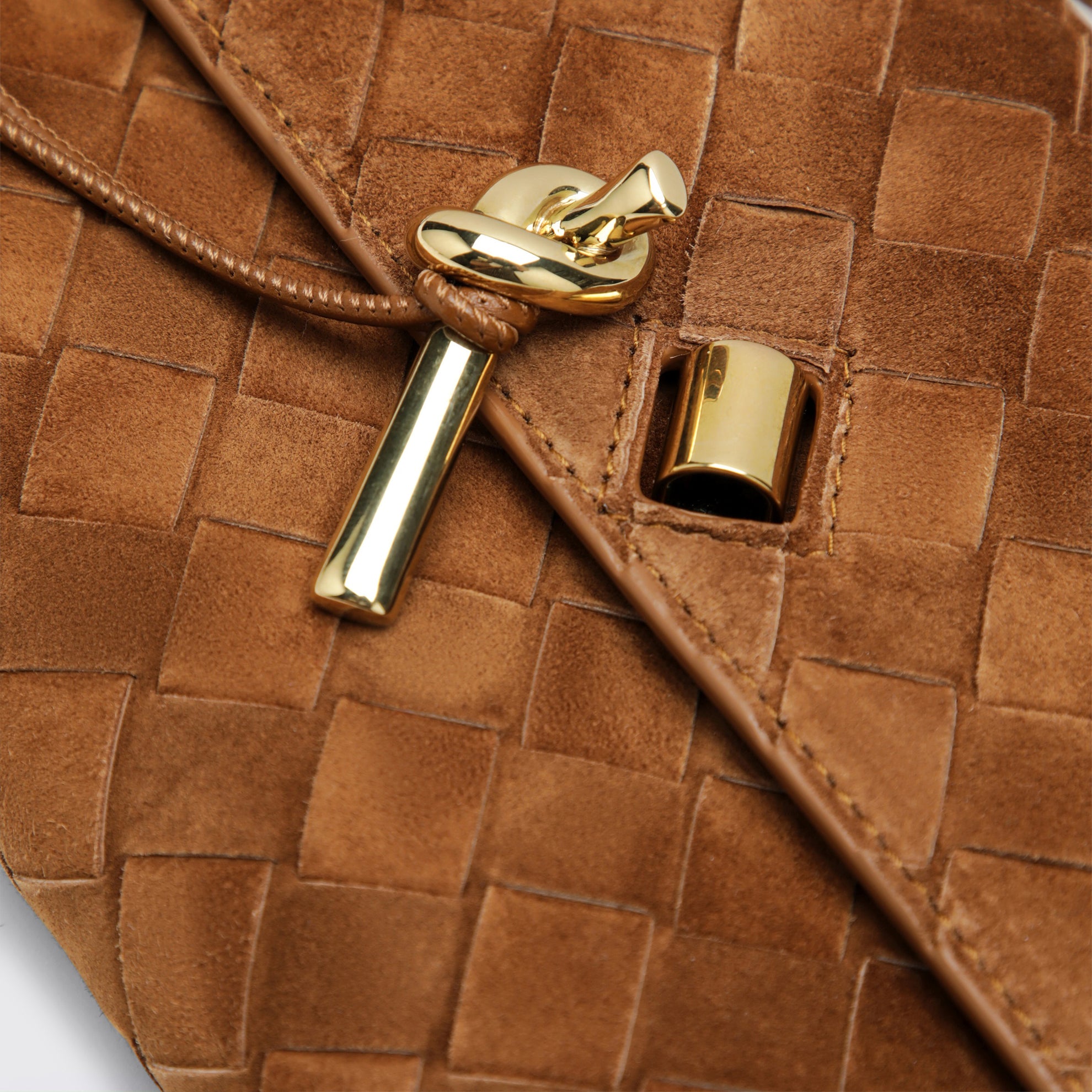 Andiamo clutch with brown suede handle