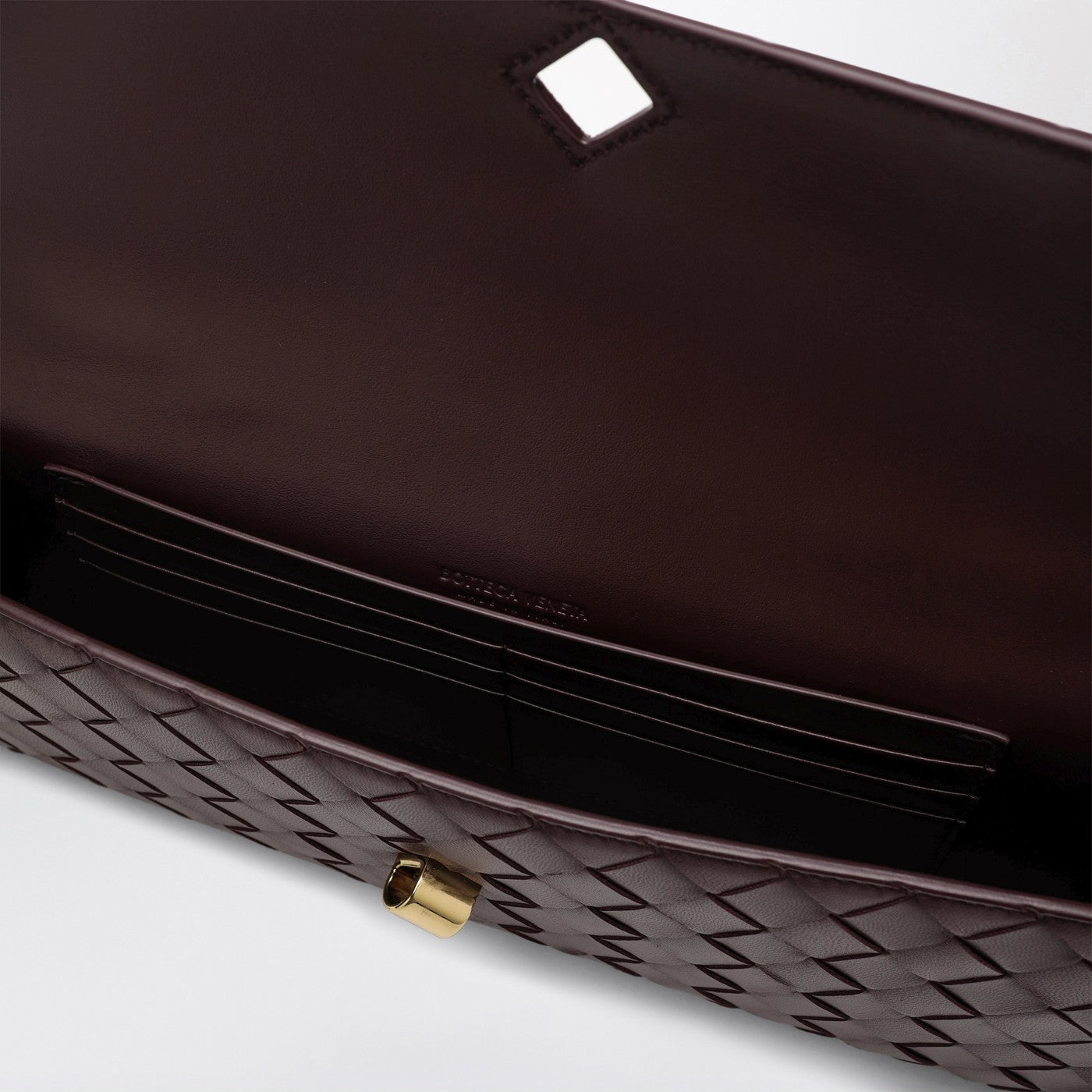 Andiamo clutch bag with handle in Dark Barolo
