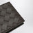 Portafoglio bi-fold Fondente in Intrecciato