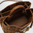 Borsa a mano Andiamo piccola in suede intrecciato color ambra