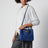 Small Andiamo handbag in Blue Royal Intrecciato suede