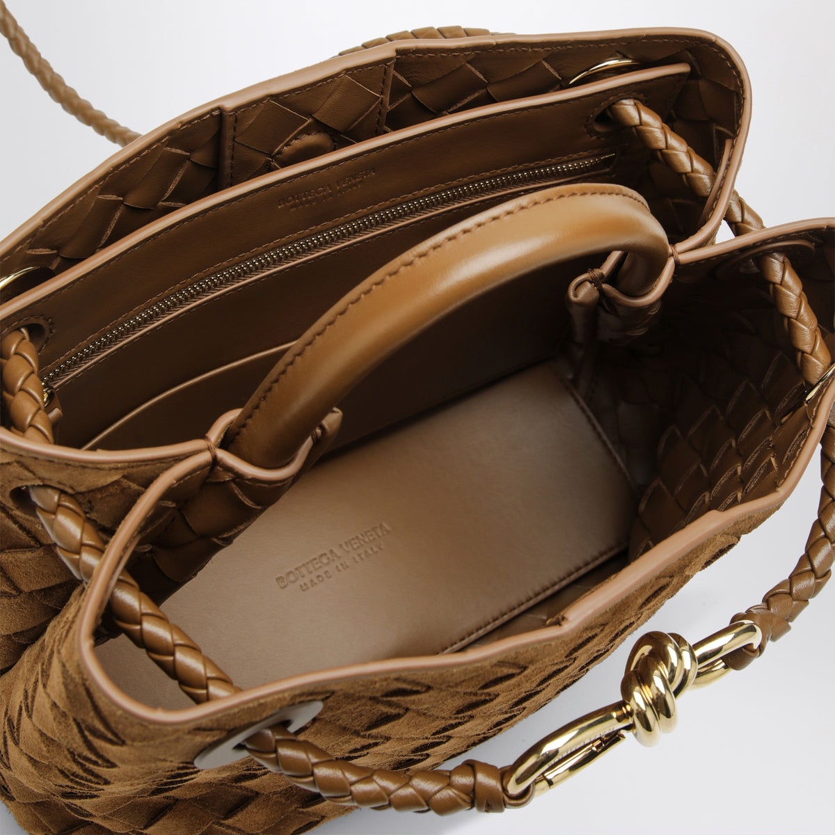 Small Andiamo handbag in caramel woven suede