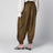 Pantaloni harem Mahon in seta color oliva
