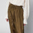 Pantaloni harem Mahon in seta color oliva