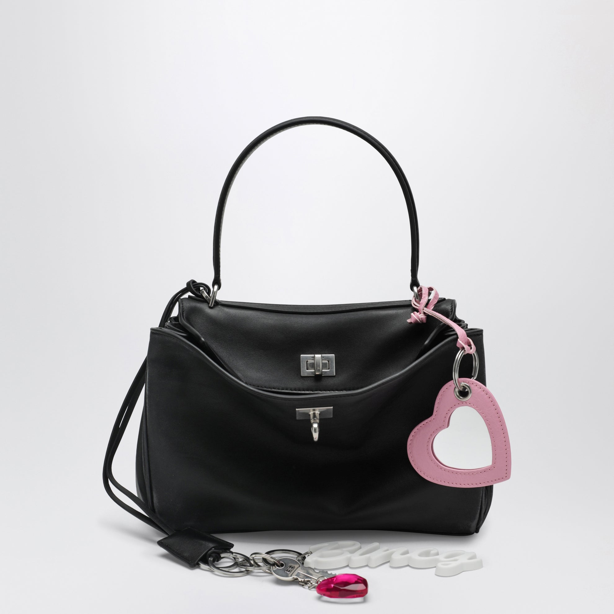 Small black Rodeo bag in smooth calf leather with charm