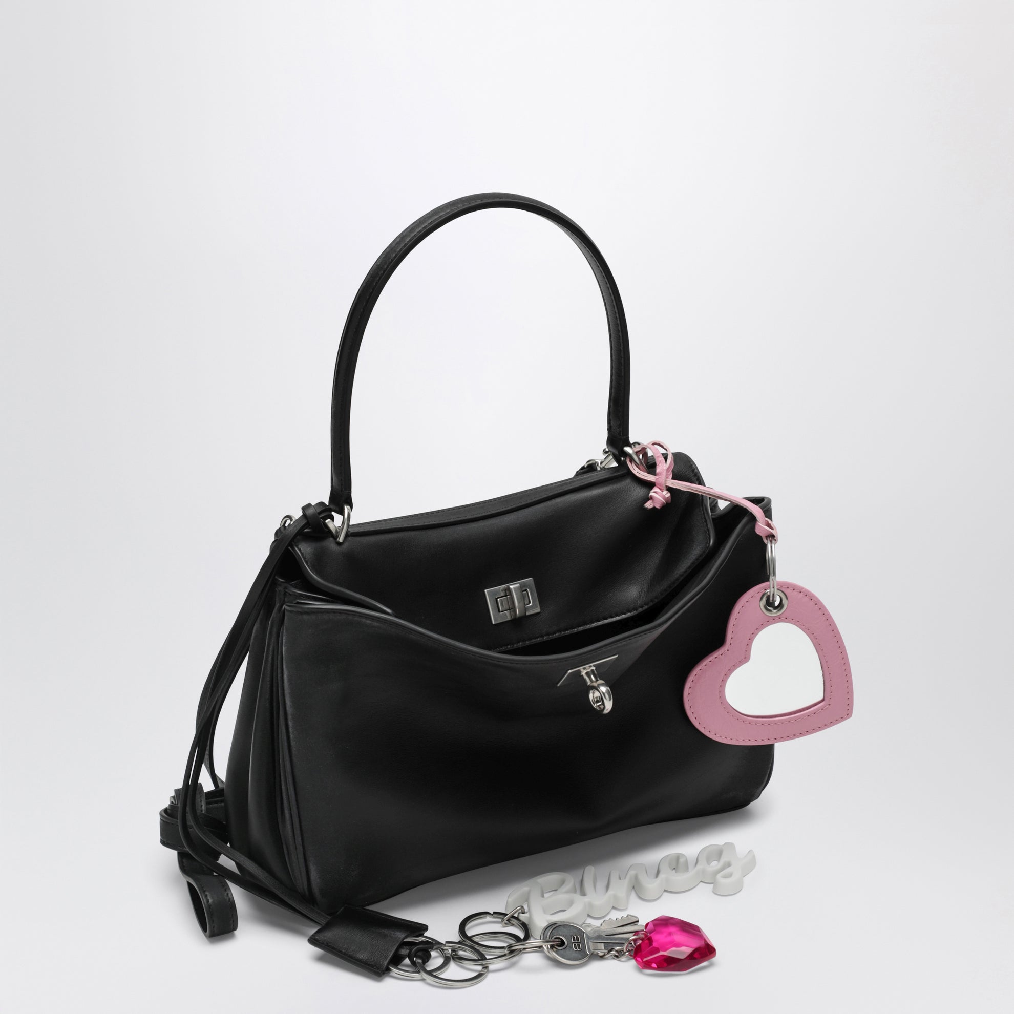 Small black Rodeo bag in smooth calf leather with charm
