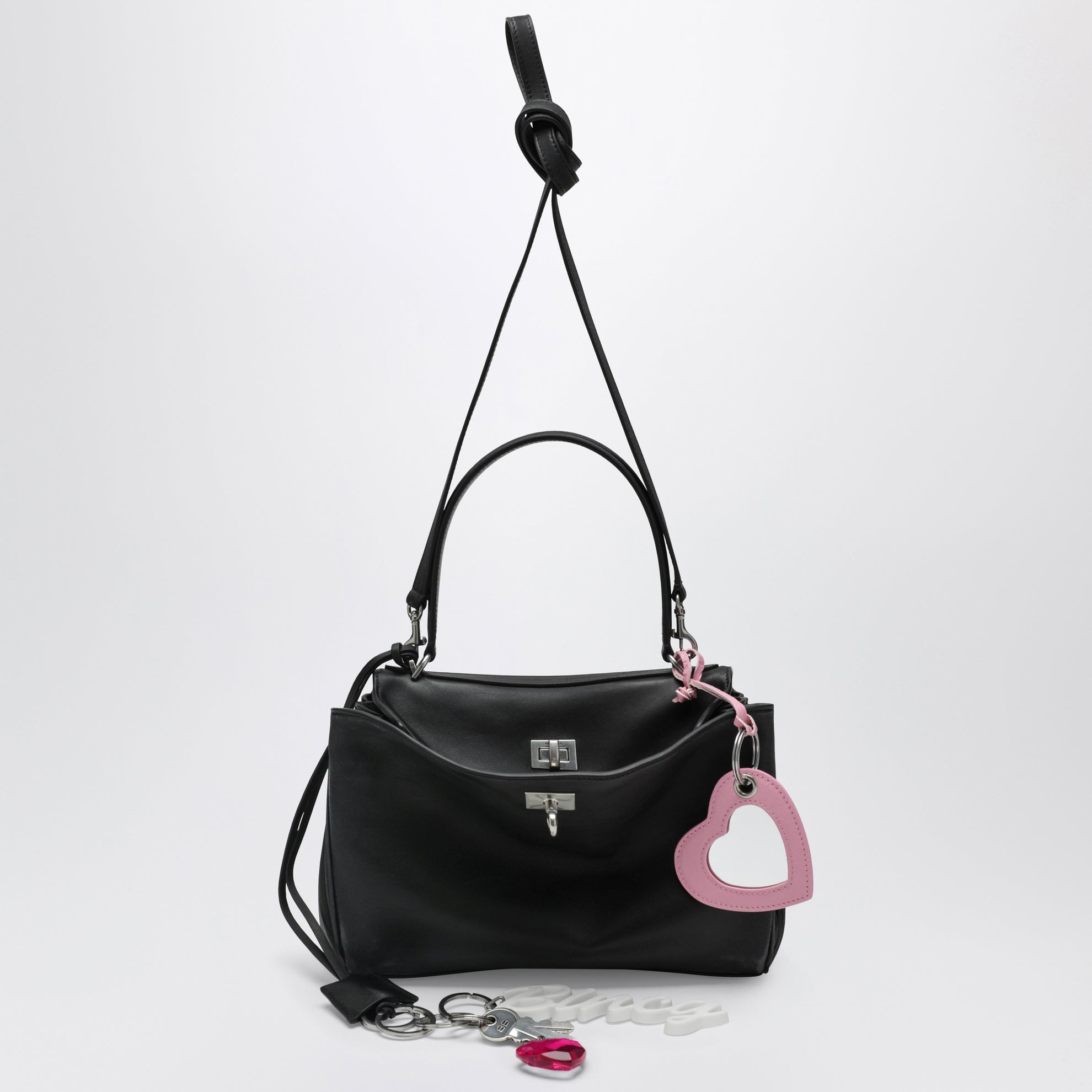 Small black Rodeo bag in smooth calf leather with charm