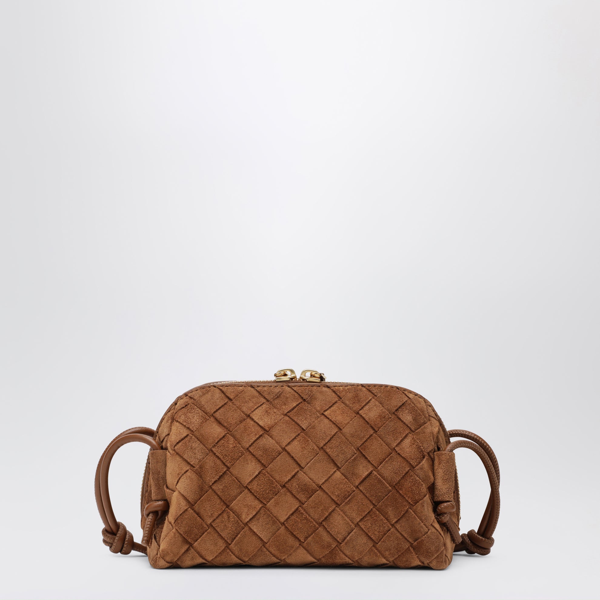 Pochette Concert tressée en cuir ambre